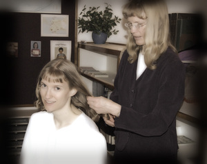 Kristina's Mother fixing her hair.
